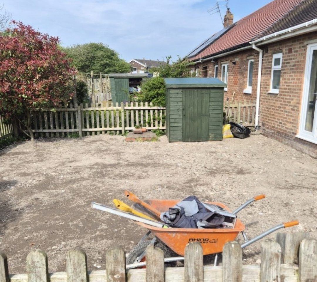 The same rear garden after site clearance, excavation and ground preparation